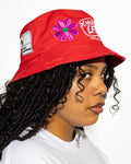 More Life CLT R&B Patchwork Distressed Bucket Hat Red – side view on model showing More Life Charlotte NC logo and R&B flaming microphone patch