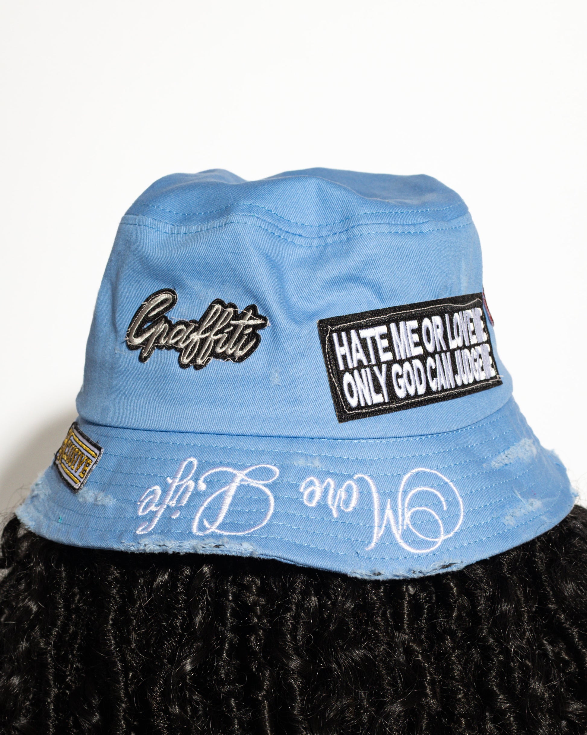 More Life CLT Breezy Bowl XX Patchwork Distressed Bucket Hat Light Blue – back view showing Graffiti patch and Hate Me or Love Me Only God Can Judge Me patch with More Life brim embroidery