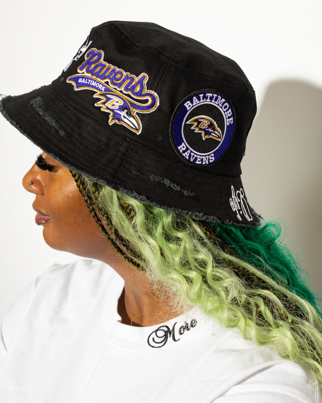 More Life CLT Baltimore Ravens Patchwork Distressed Bucket Hat Black – side view showing Ravens script and circular badge patches