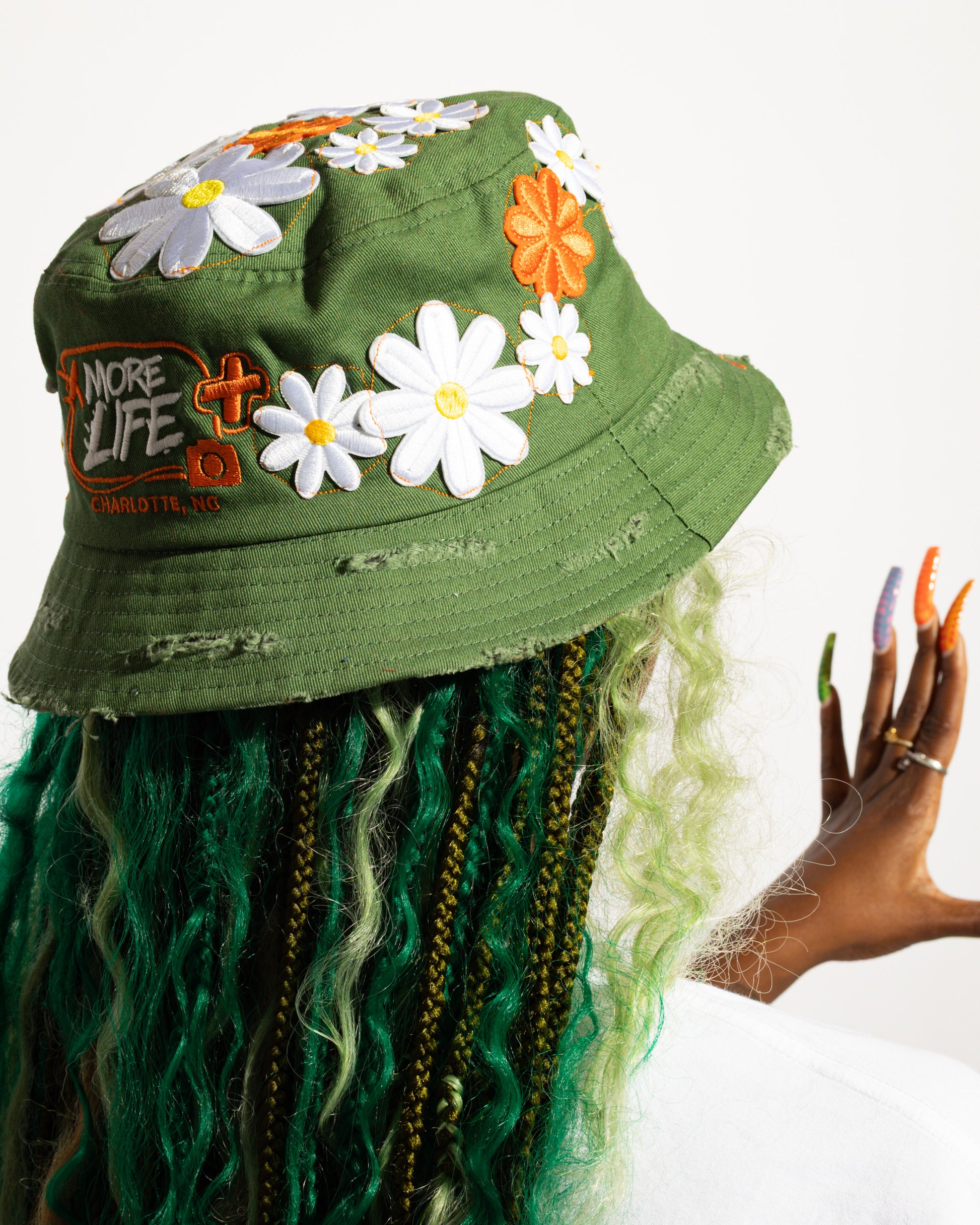 More Life CLT Custom TMNT Bucket Hat Purple – side view showing TMNT group patch on purple distressed base